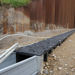 Lesanco Castioni Transition from groundmounted TERRAsystem cableducts to elevated ARCOsystem.